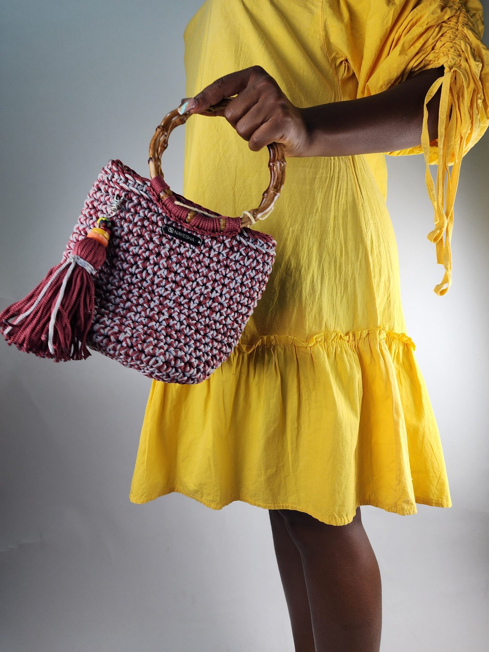 Two-toned small Akorfa Goga crochet handbag