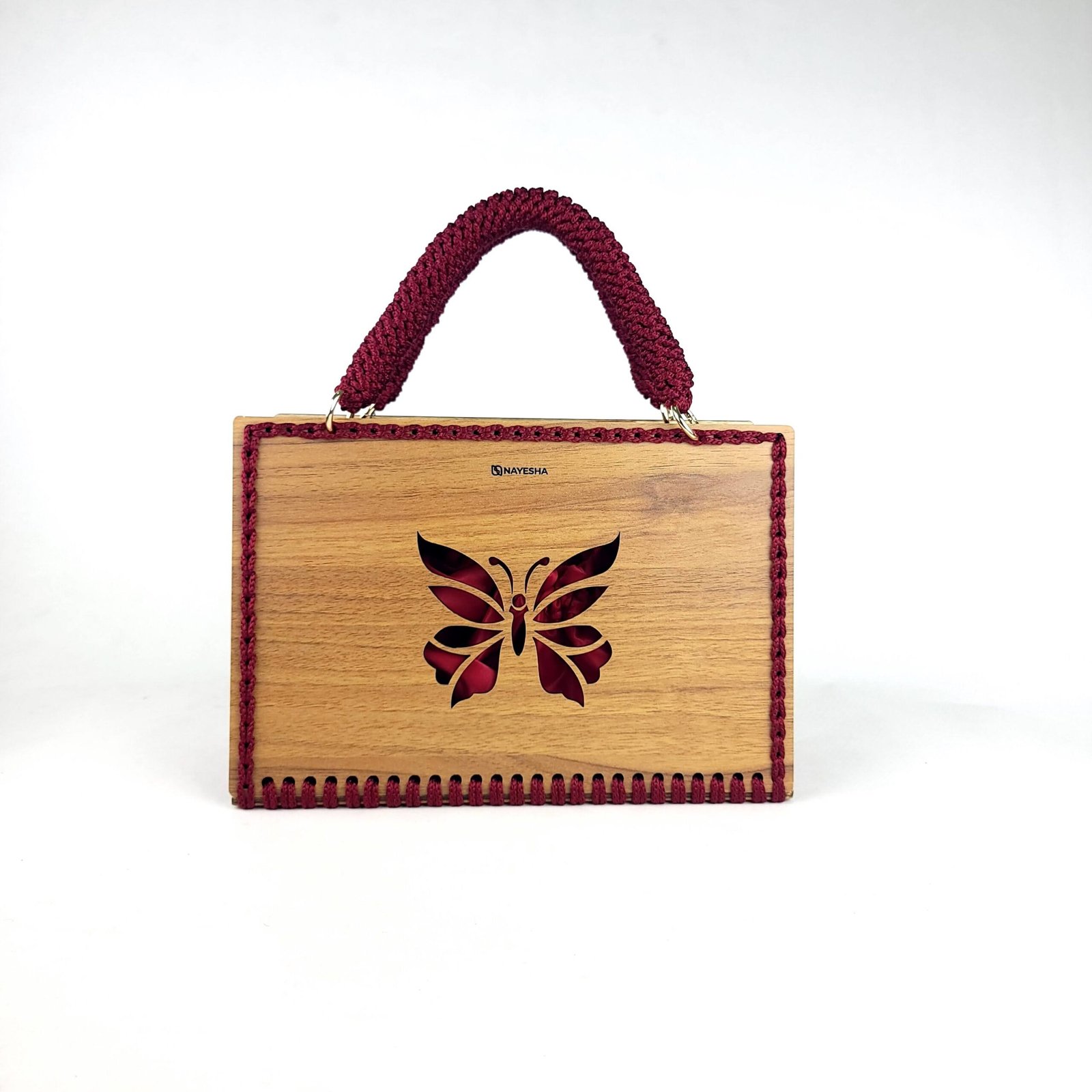 Daafua large-wood carved plate crochet handbag