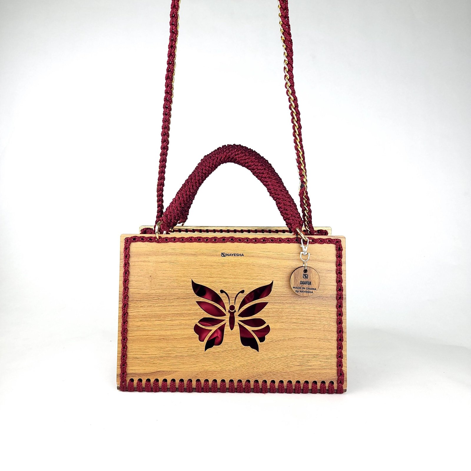 Daafua large-wood carved plate crochet handbag