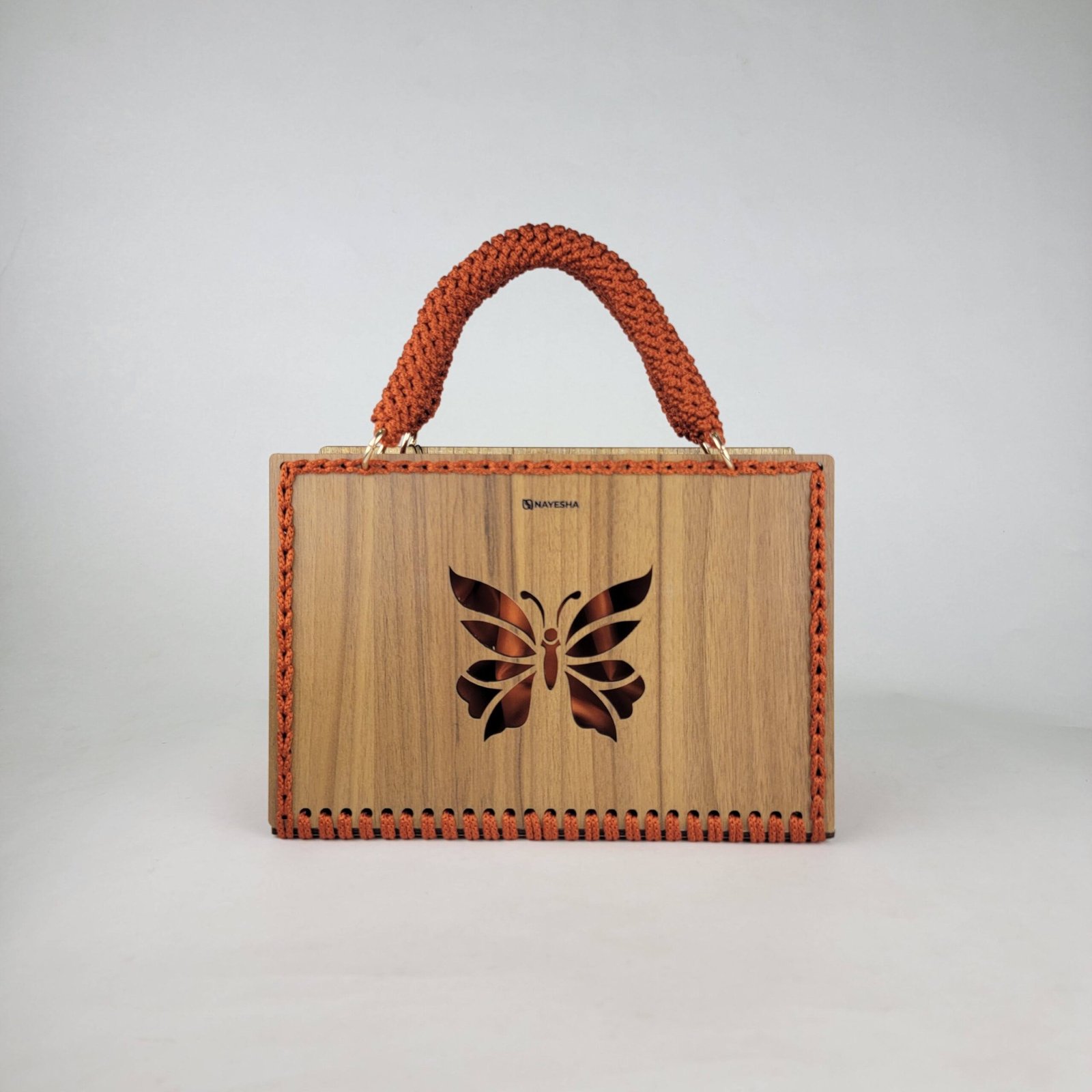 Daafua large-wood carved plate crochet handbag