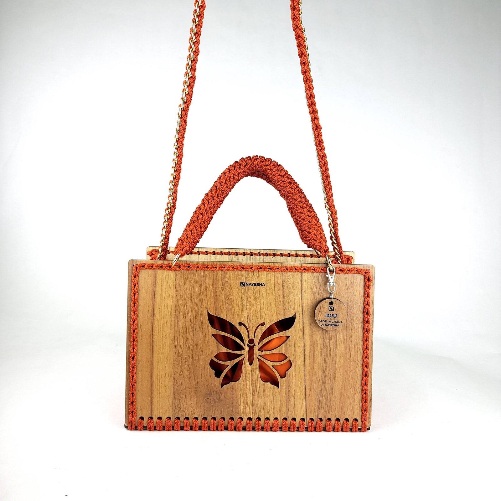 Daafua large-wood carved plate crochet handbag