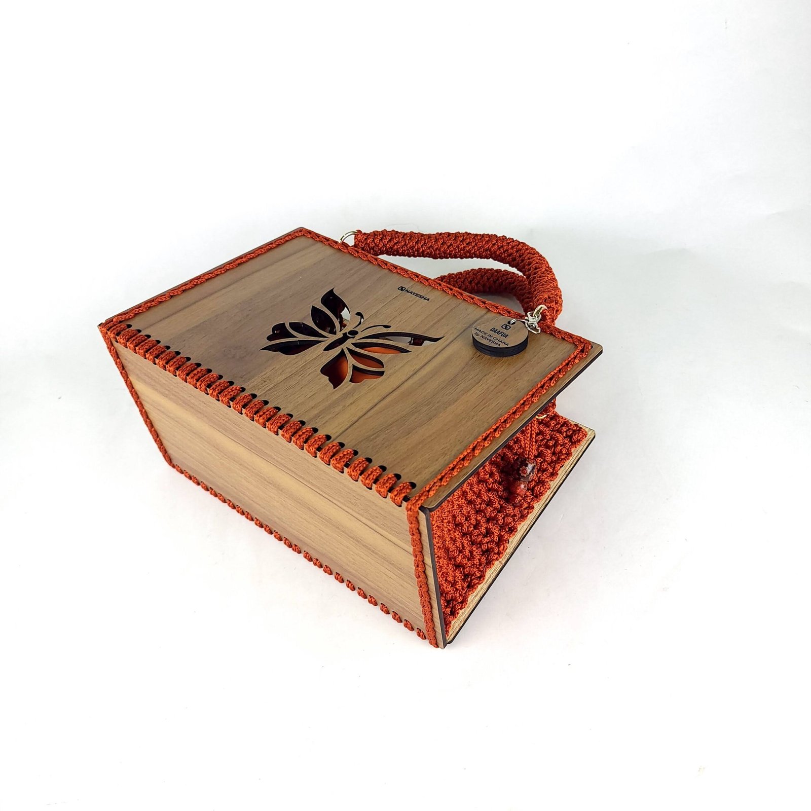 Daafua large-wood carved plate crochet handbag