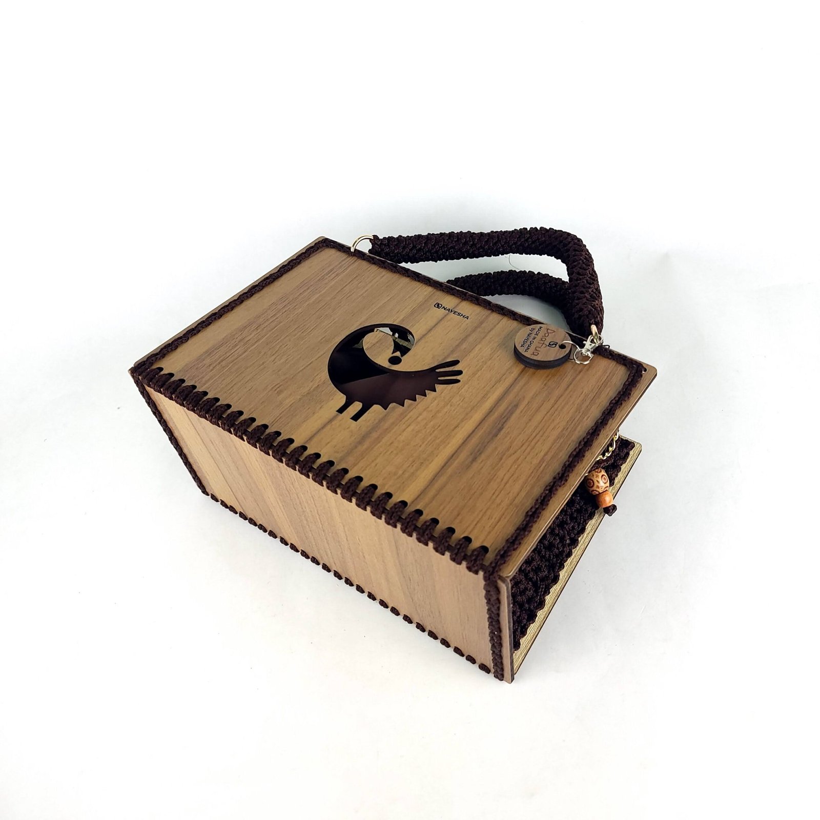 Daafua large-wood carved plate crochet handbag