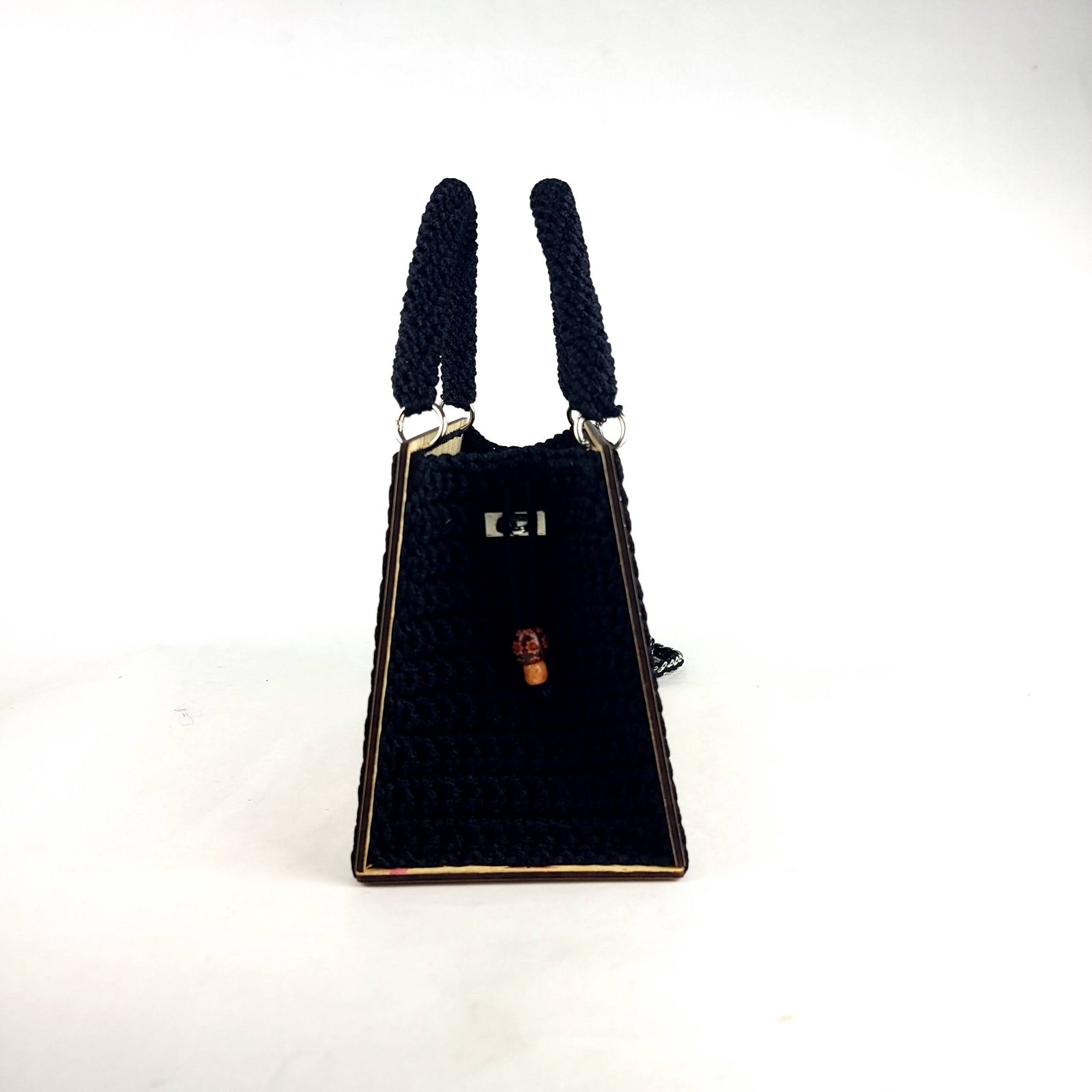 Daafua large-wood carved plate crochet handbag