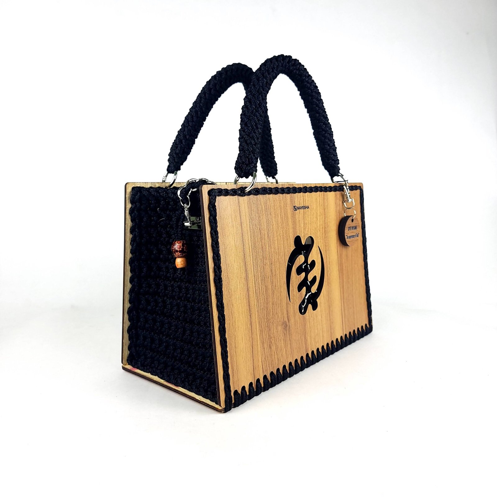 Daafua large-wood carved plate crochet handbag