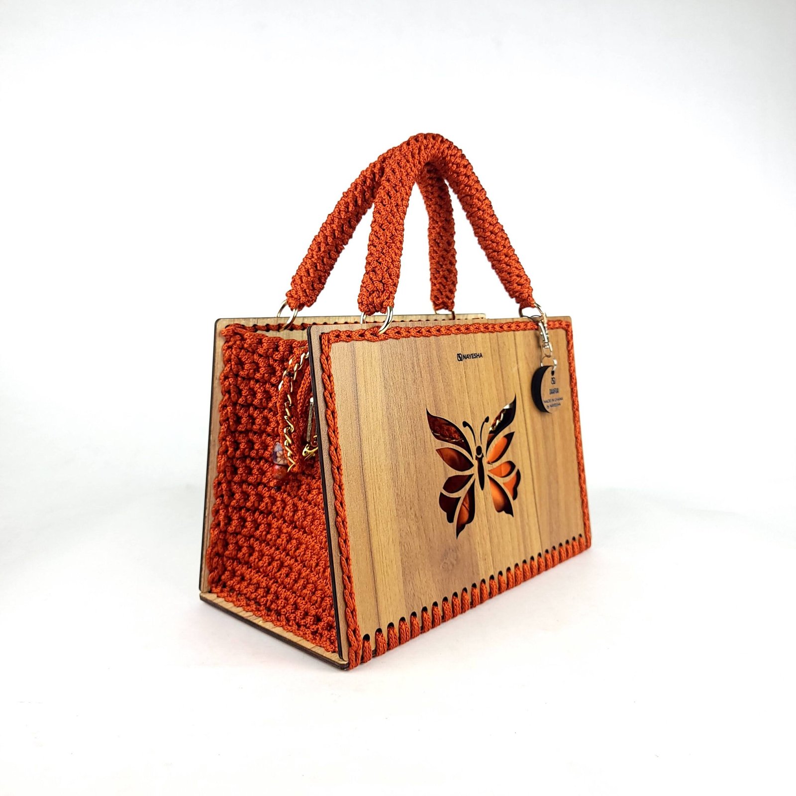 Daafua large-wood carved plate crochet handbag