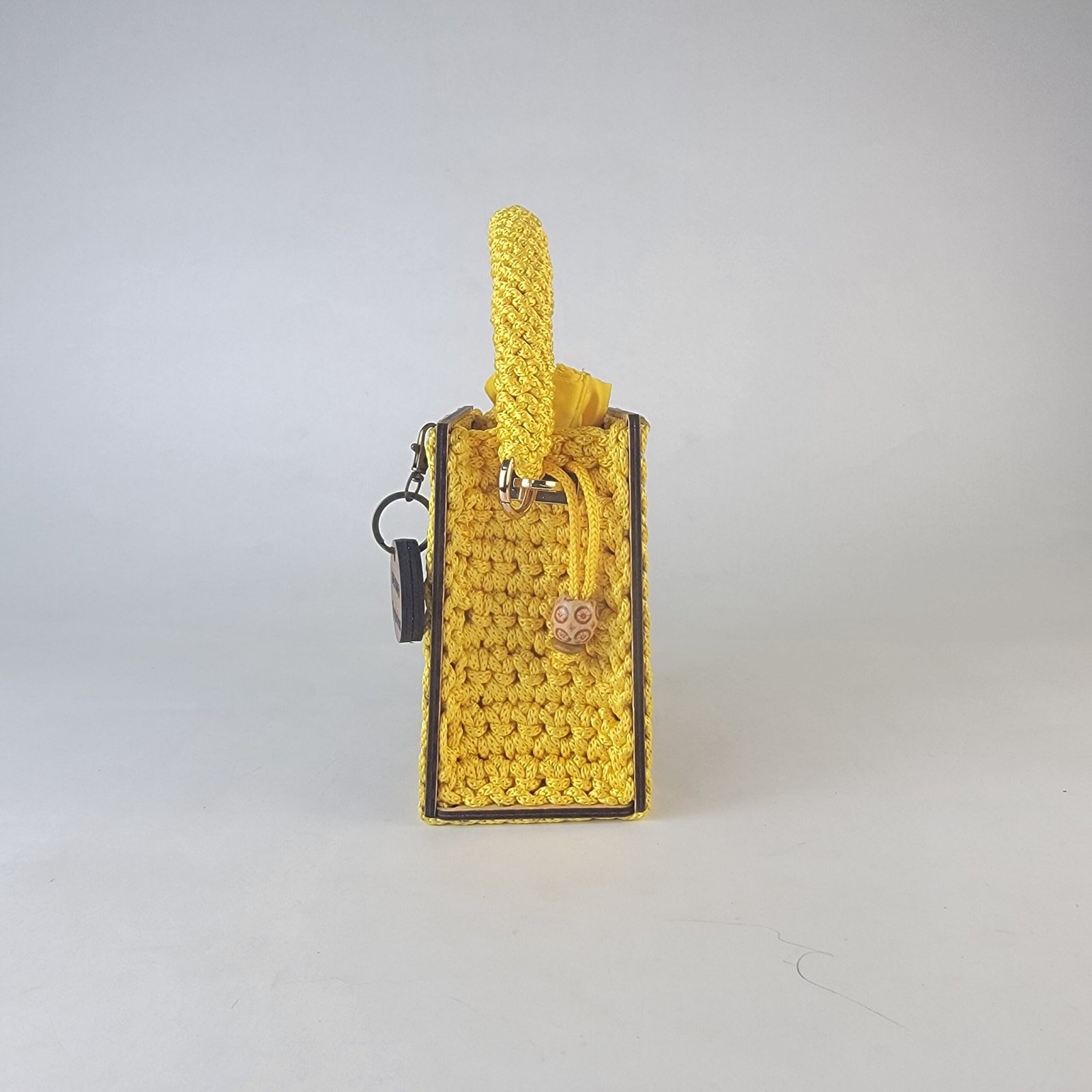 Daafua mini-wood carved plate crochet handbag