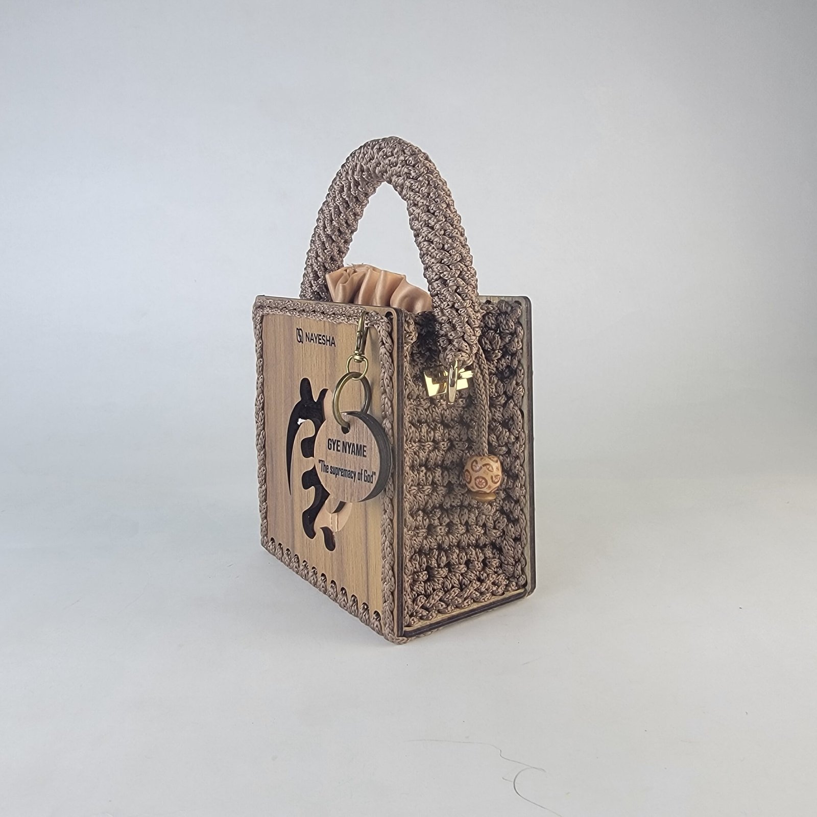 Daafua mini-wood carved plate crochet handbag