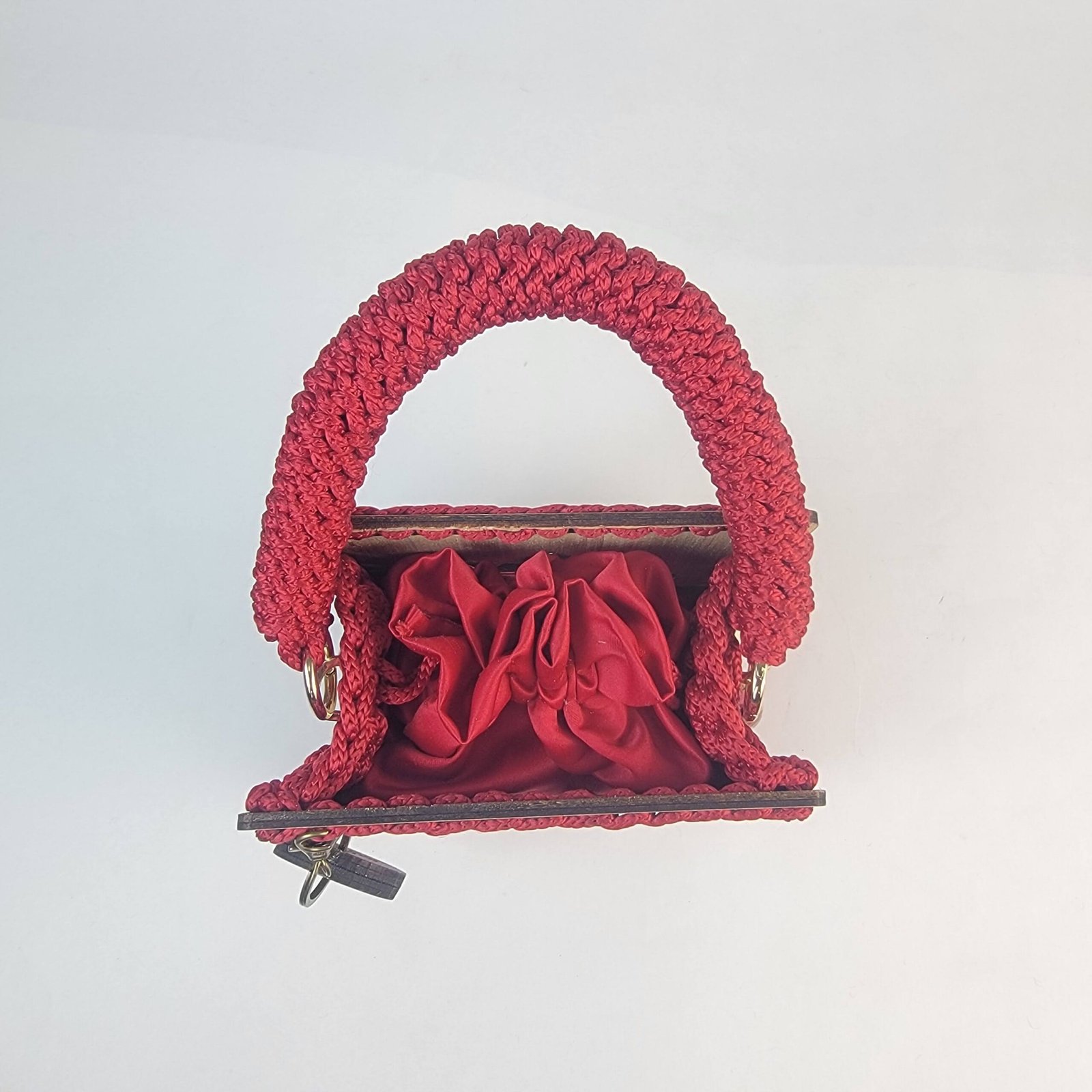 Daafua mini-wood carved plate crochet handbag