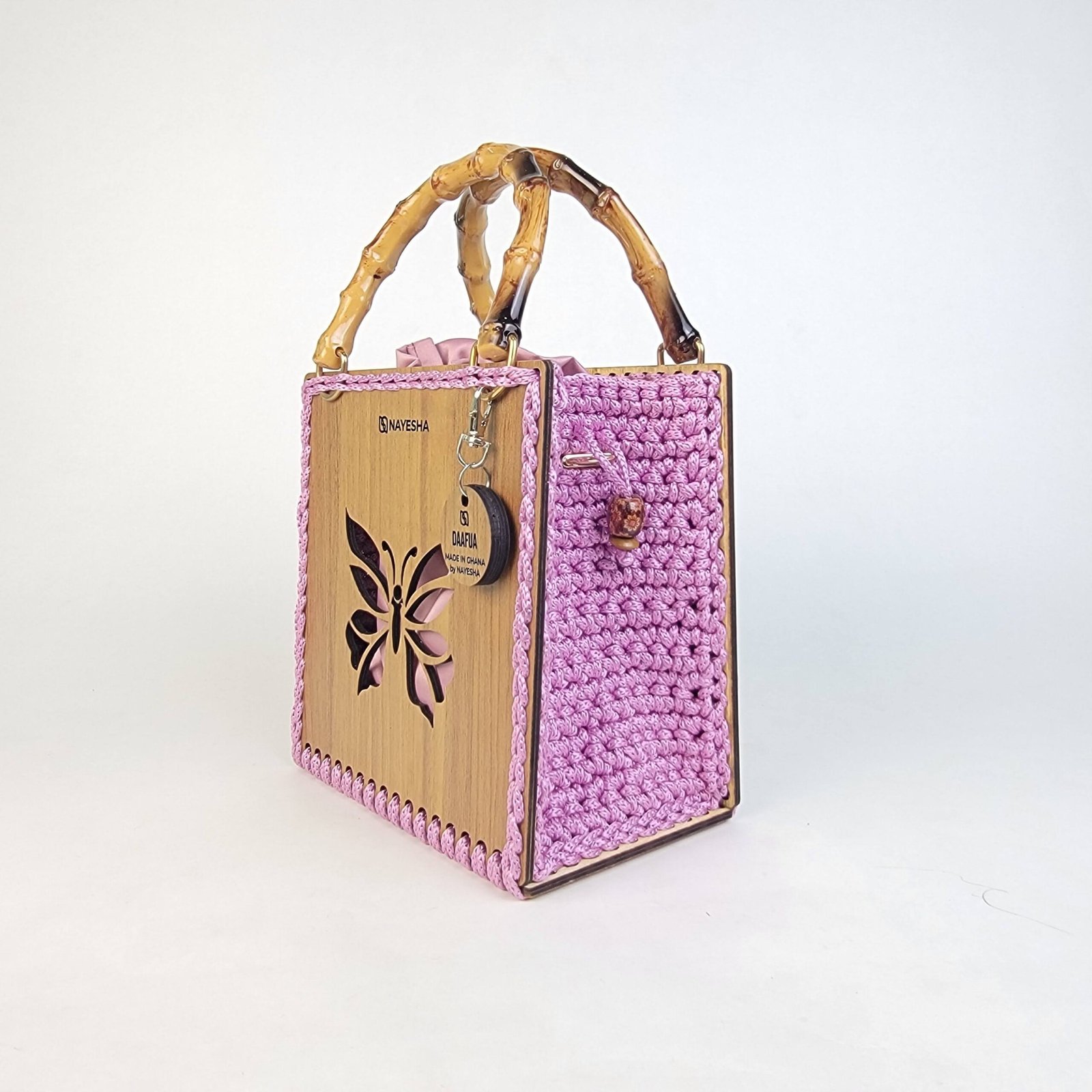 Daafua medium-wood carved plate crochet handbag