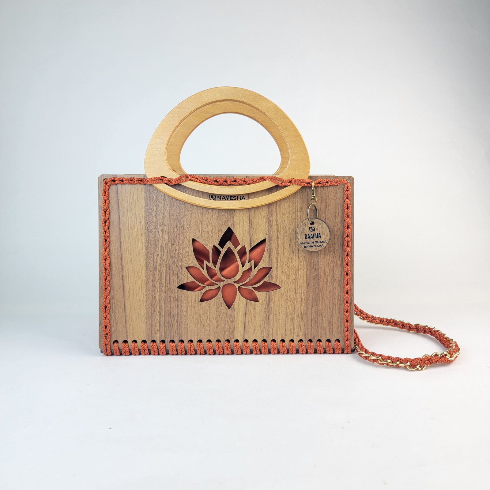 Daafua large-wood carved plate crochet handbag