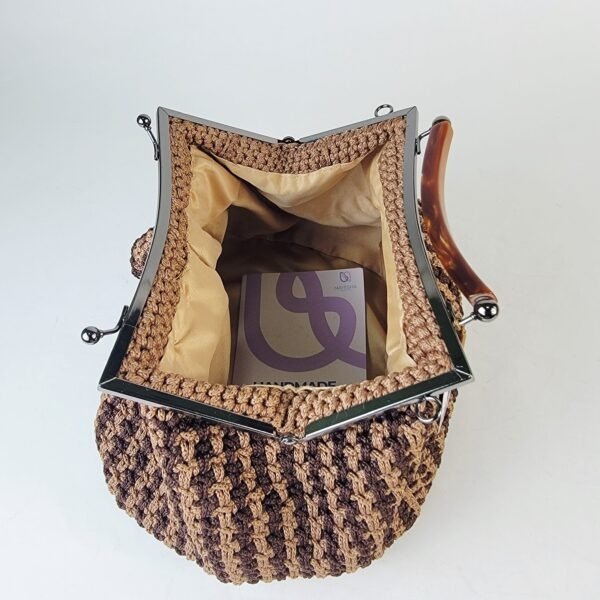 Naki Clutch (metal/plastic handle)