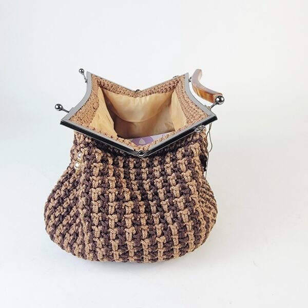 Naki Clutch (metal/plastic handle)