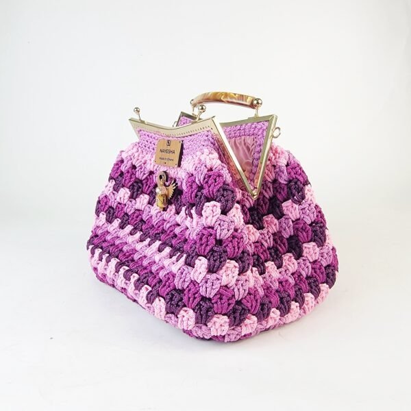Naki Clutch (metal/plastic handle)