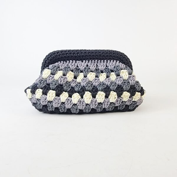20260216_093424 Naki Clutch (medium)