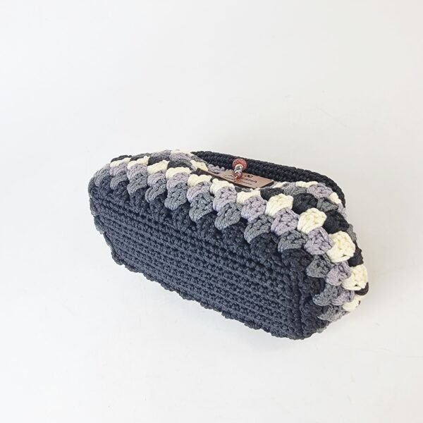 20260216_093439 Naki Clutch (medium)
