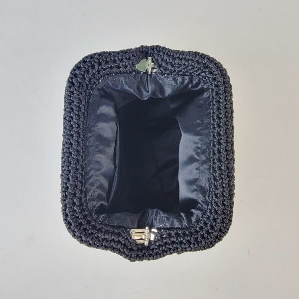 20260216_093509 Naki Clutch (medium)