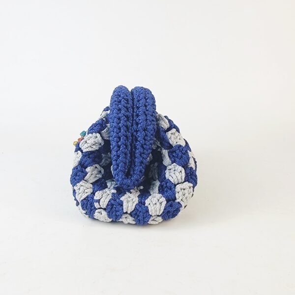 20260303_085611 Naki Clutch (medium)