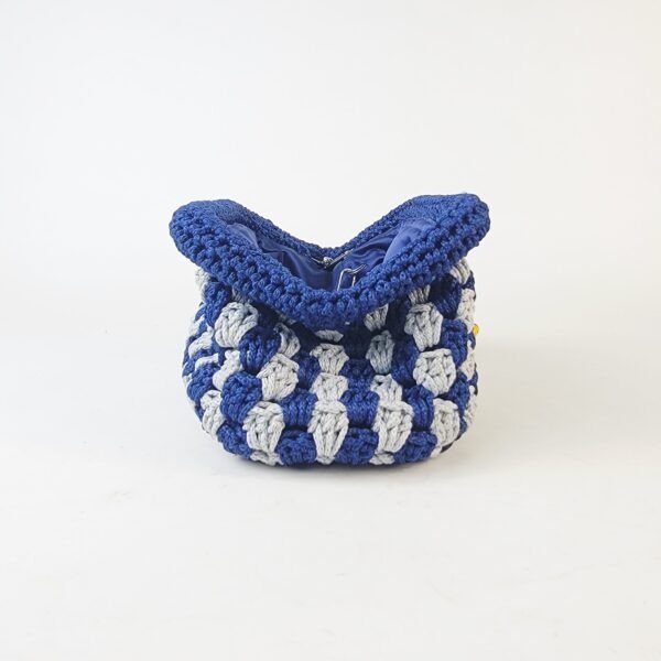 20260303_085655 Naki Clutch (medium)