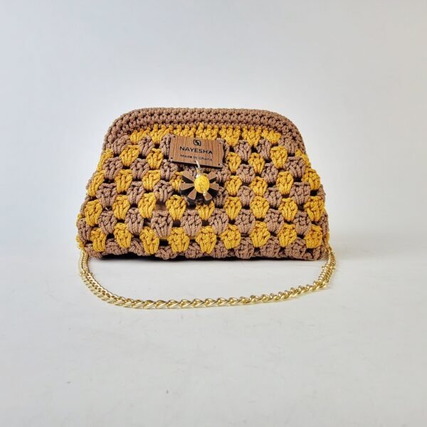 20260317_091808 Naki Clutch (medium)