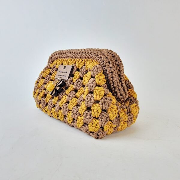 20260317_091838 Naki Clutch (medium)