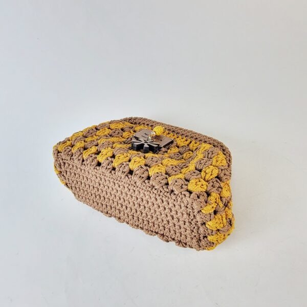 20260317_091918 Naki Clutch (medium)