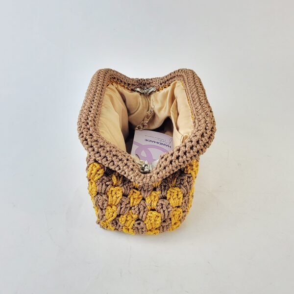 20260317_091936 Naki Clutch (medium)
