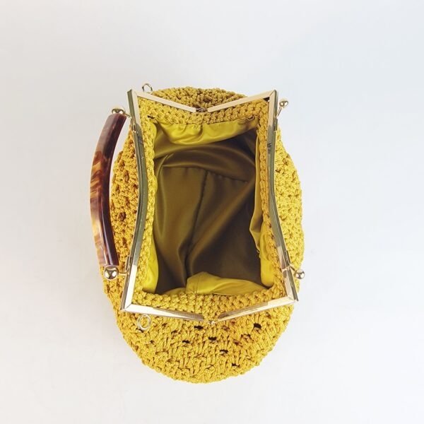 Naki Clutch (metal/plastic handle)